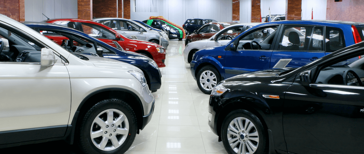 row of cars at dealership